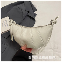 2025小众设计高级感头层软牛皮牛角包饺子包简约百搭单肩斜挎新款