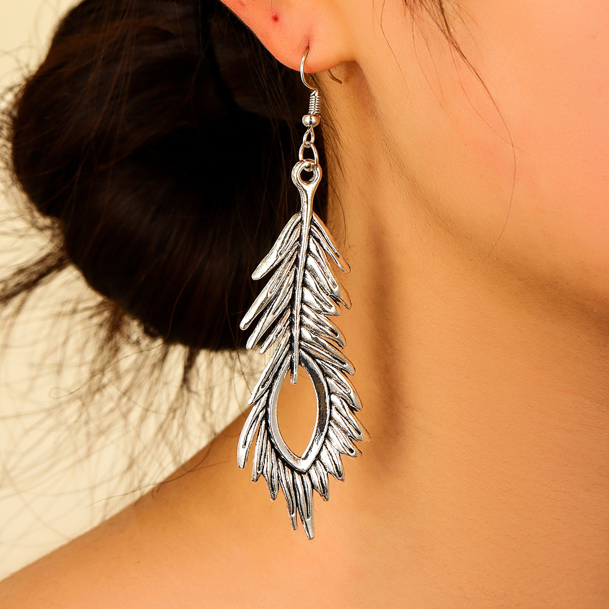 亚马逊新款欧美复古镂空孔雀羽毛耳环个性气质合金树枝耳环女批发