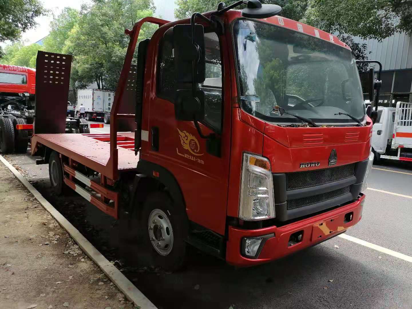 重汽豪沃蓝牌平板拖车价格(国六) 程力威牌clw5040tqzz6平板拖车