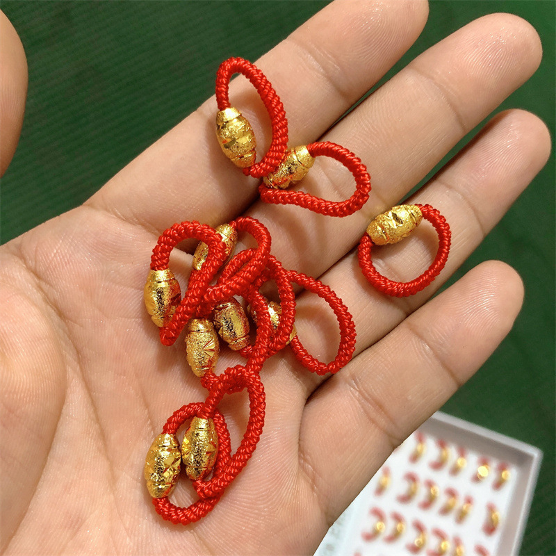 新品红绳转运珠戒指金色椭圆珠编制指环小礼品赠品2元店货源