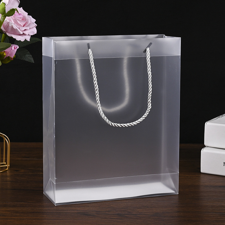 现货pp透明磨砂手提袋塑料服装pvc购物袋空白手提塑料袋加印logo