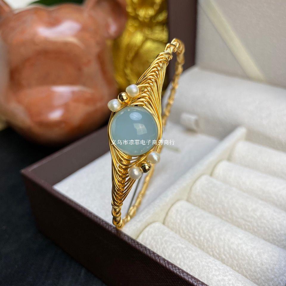海蓝宝搭配淡水珍珠天使之眼单珠原创绕线手镯-阿里巴巴