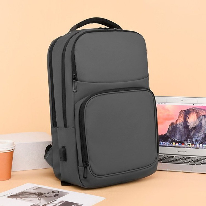 简约跨境潮流商务通勤双肩包男士行李旅行背包多功能笔记本电脑包