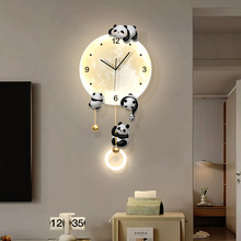 客厅熊猫挂钟电视背景墙月球创意时钟壁灯轻奢餐厅背景墙钟表画