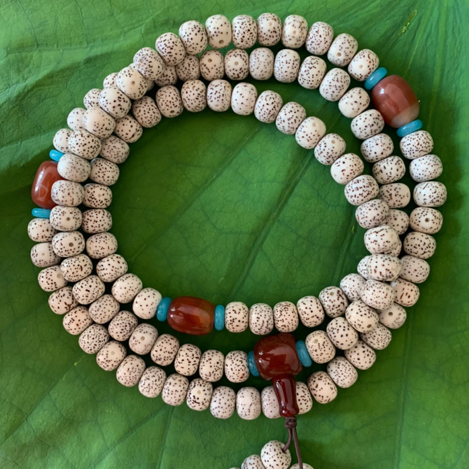 海南星月菩提正月朱砂供石玉料高密108颗佛珠手链项链桶珠大留白