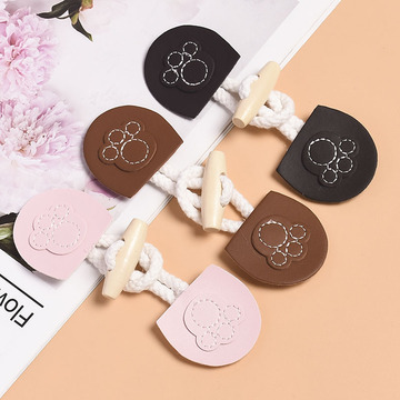 皮对扣儿童大衣服搭扣外套仿牛角扣风衣纽扣对扣配件毛呢熊掌扣子