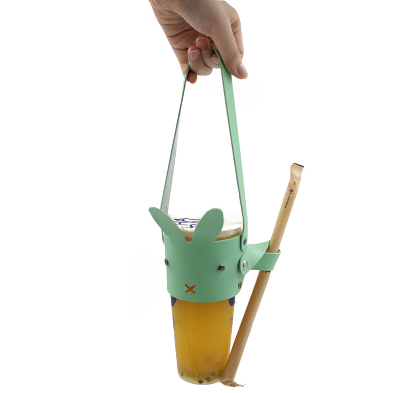 现货可爱兔子形状奶茶塑料杯饮料提手 隔热隔烫冰霸杯皮革杯套