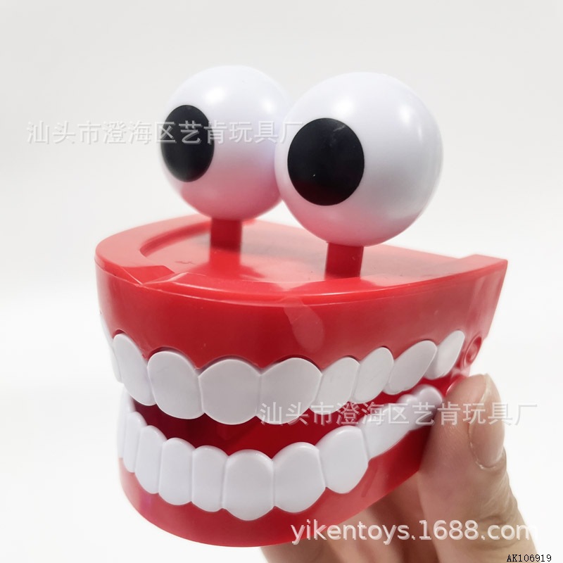 跨境新品新奇特玩具发条上链带眼睛跳跳牙鬼牙小玩具牙科牙齿模型