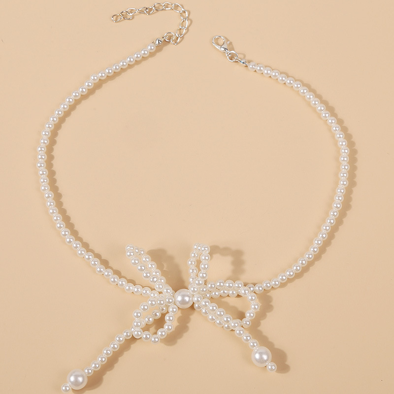 韩式简约可爱手工编织珍珠蝴蝶结项链 欧美个性串珠颈链饰品