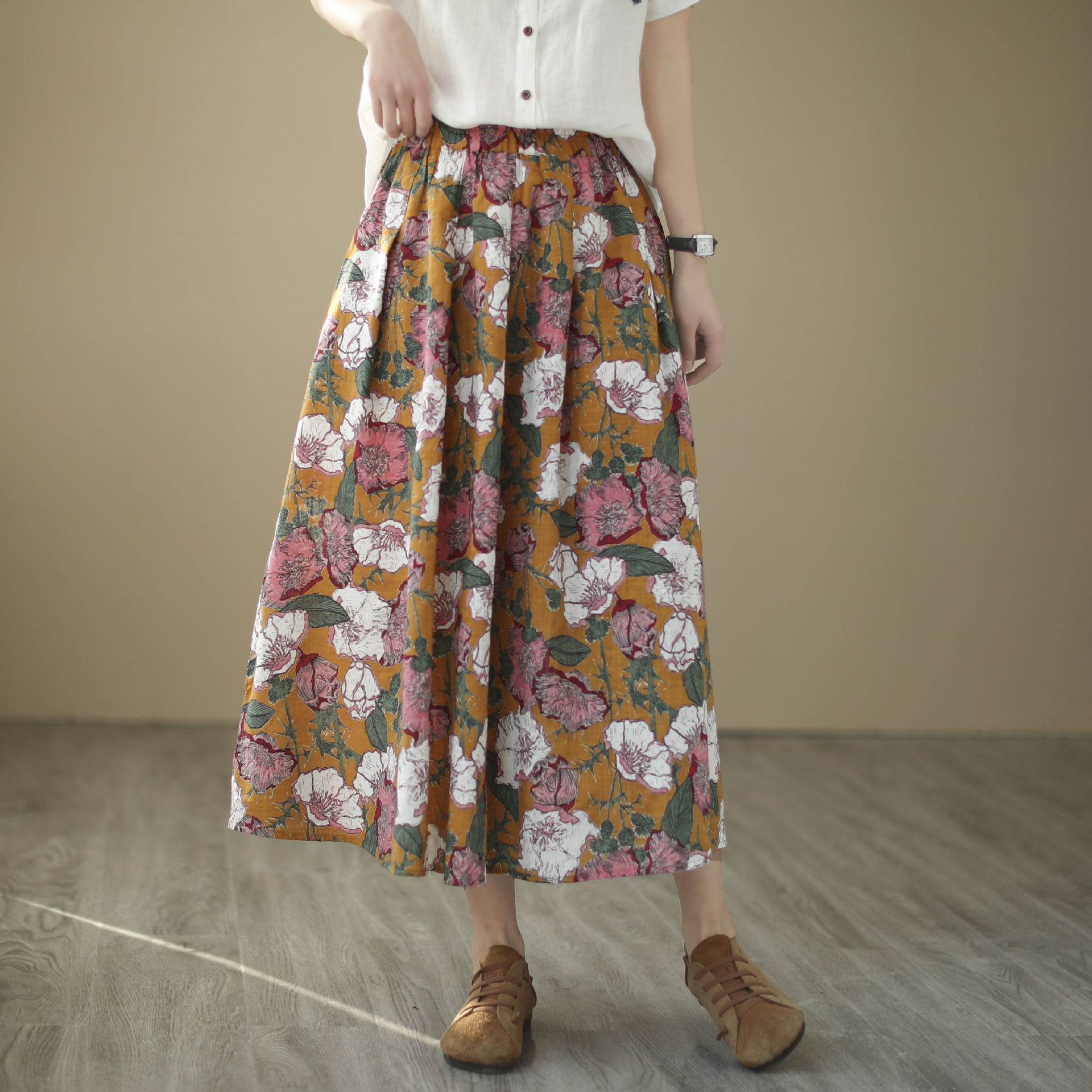 文艺棉麻中长款印花半身裙女2022春季新款高腰休闲气质显瘦大摆裙