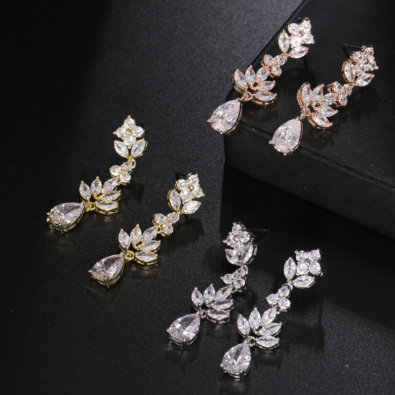 艾儿摩莎跨境亮雅丽人新款小花朵系列休闲锆石耳环女花朵流苏现货