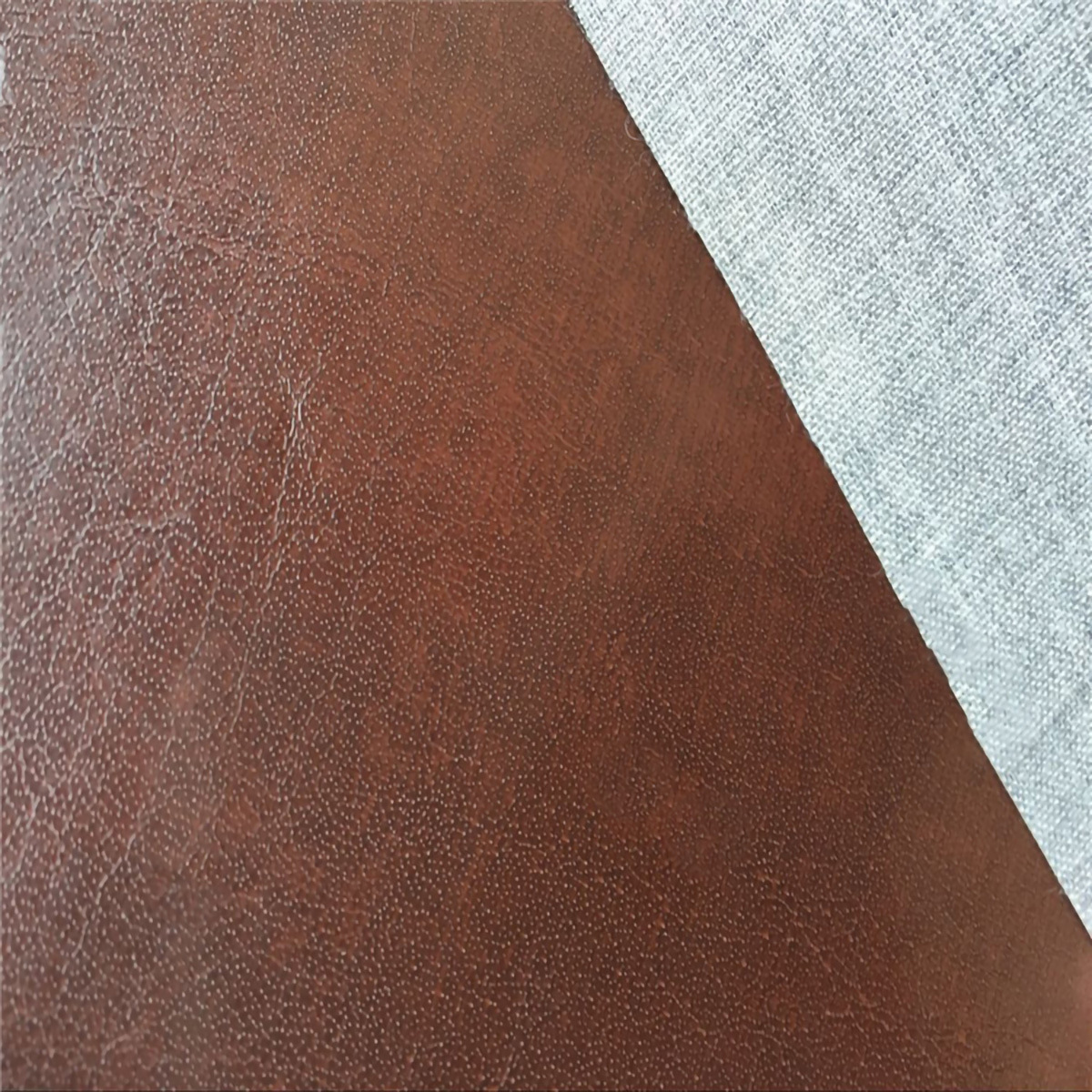 咖色pu皮料 m103纹pu皮革 手袋箱包钱包腰带革 tc布底0.6 环保