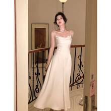 法式白色吊带连衣裙女装2023新款缎面收腰高级感裙子度假裙