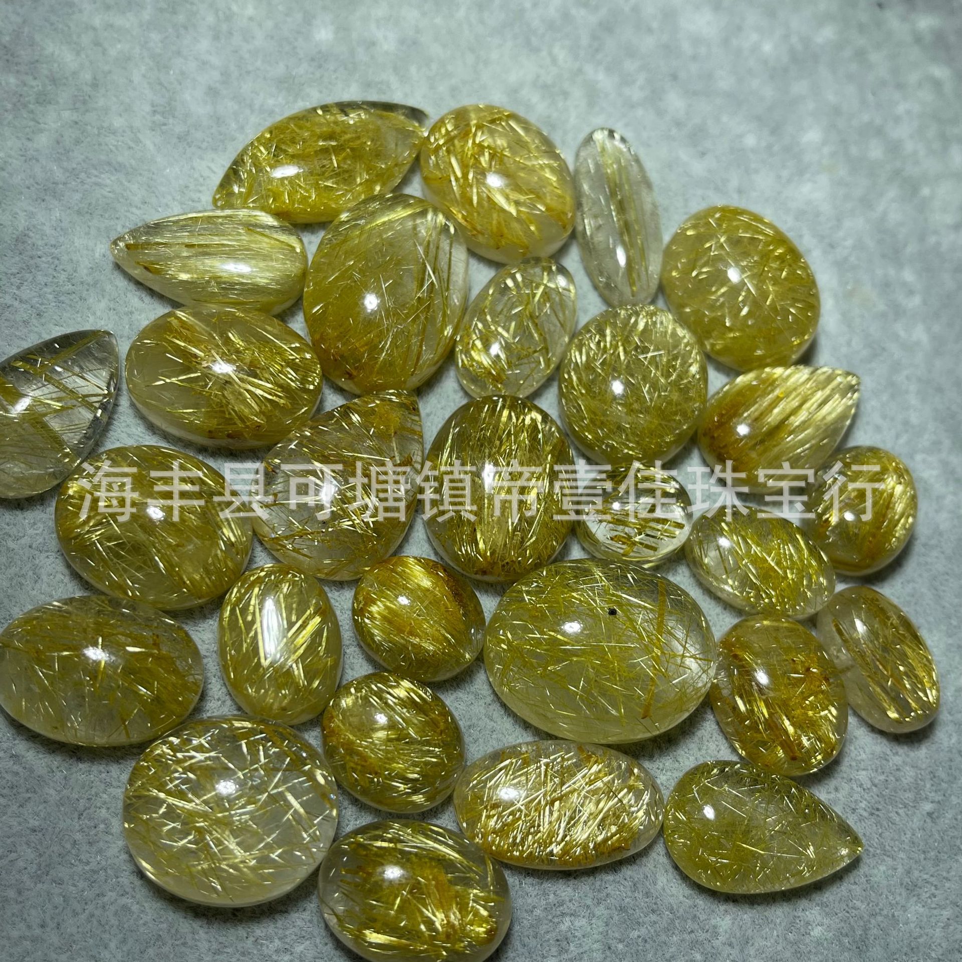 天然金发晶金钛戒面吊坠批发 带猫眼晶体通透金钛晶戒面裸石半成