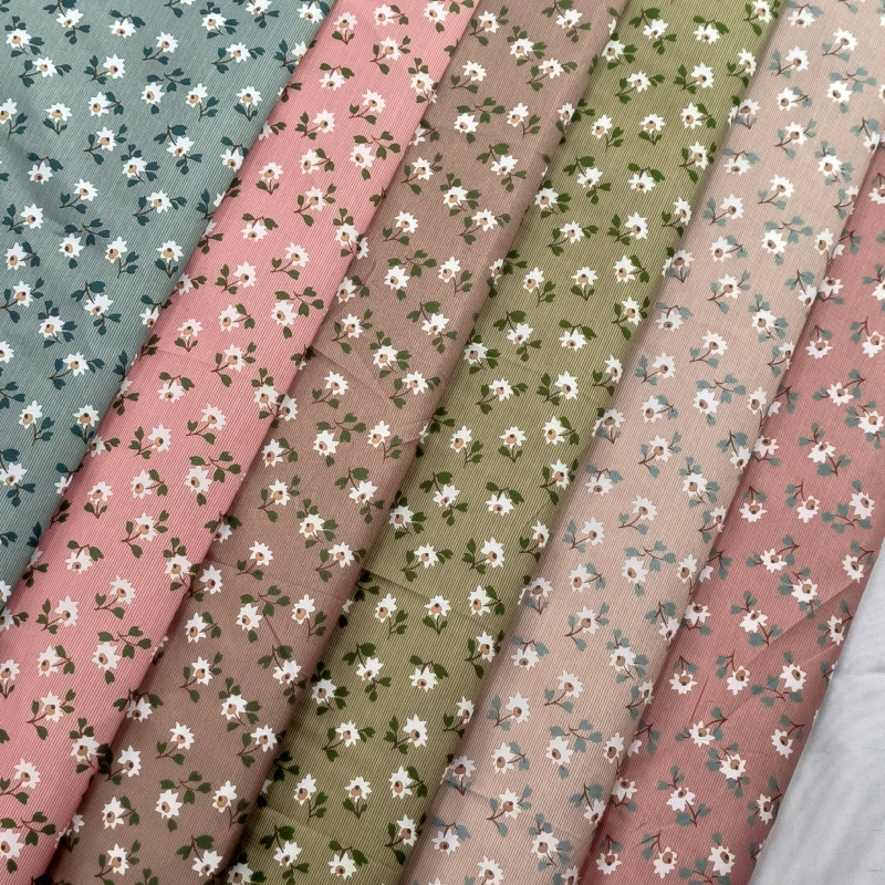 平纹桃皮绒沙滩裤布料 宠物衣服箱包里布口袋布 涤纶小碎花布料