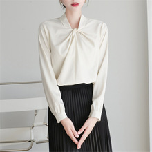 白色立领衬衫女设计感扭结2024春季新款韩版气质时尚百搭显瘦上衣