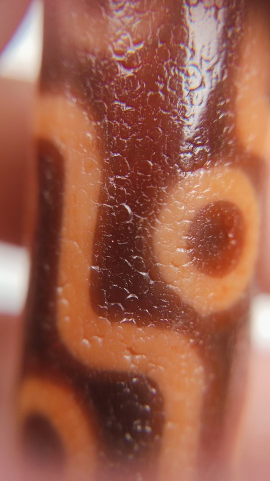 藏区老料朱砂龙鳞纹古法措丝水纹九眼天珠桔皮红肉朱14.6x51.3mma