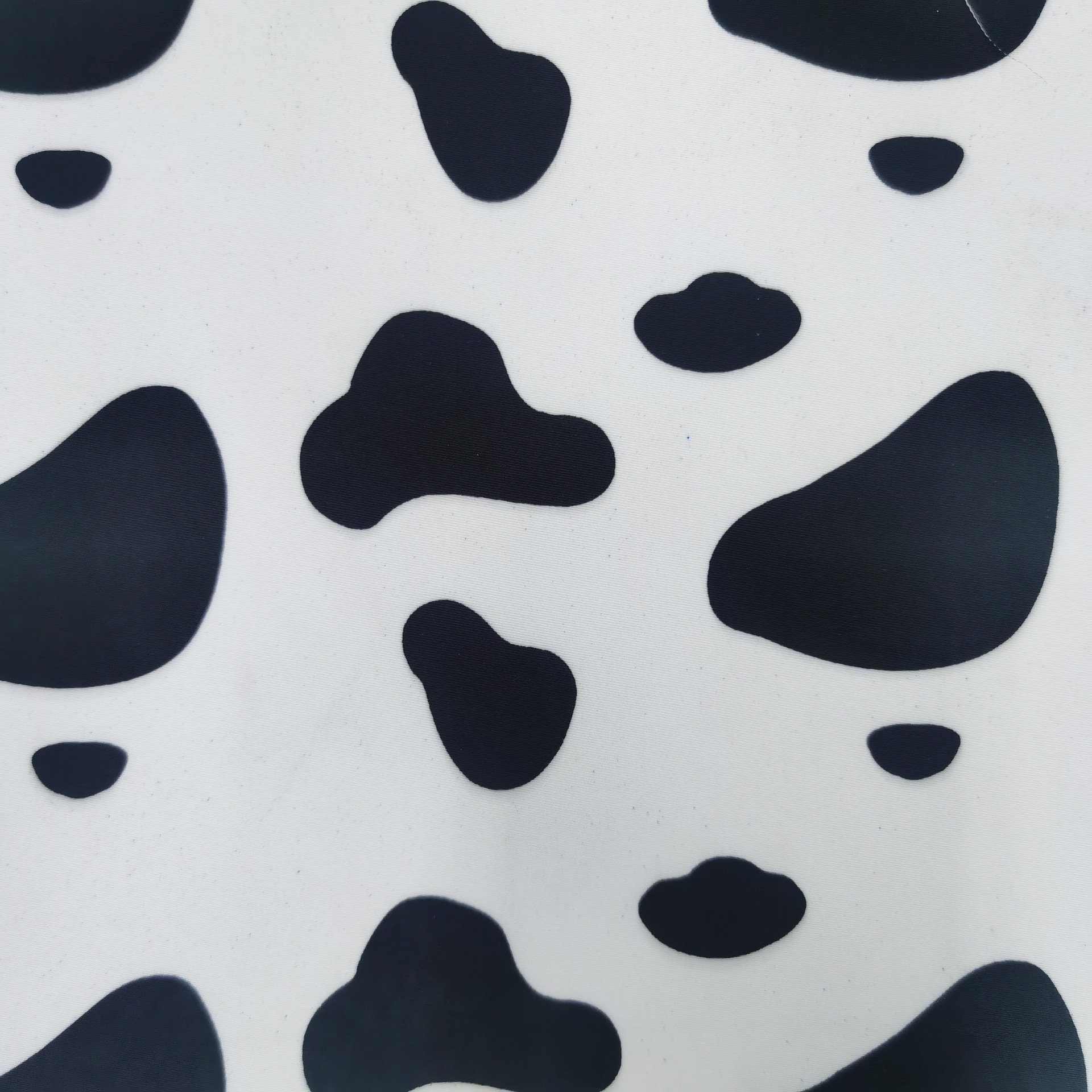 210d涤纶面料奶牛纹热转印印花斜纹印花面料箱包面料