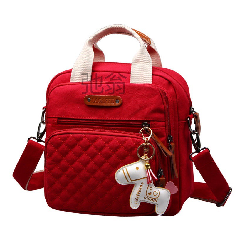 跟c【抢挂件小熊】妈咪包双肩包女多功能大容量母婴包帆布包斜挎