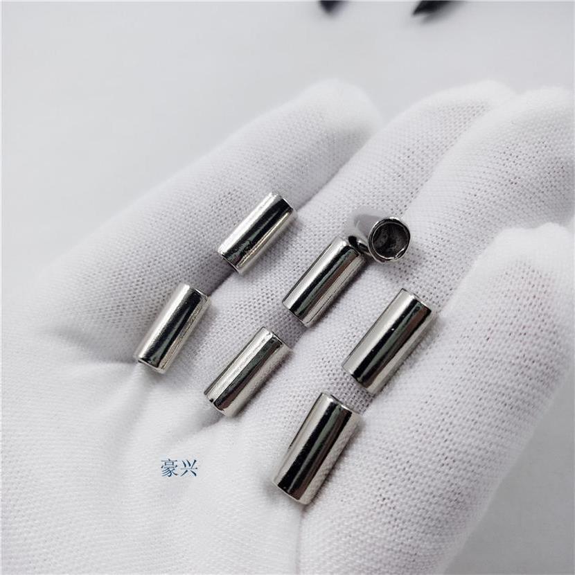 12成交0粒金属光身吊钟扣 时装装饰扣帽钟 椭圆扁吊钟 通用绳头配件