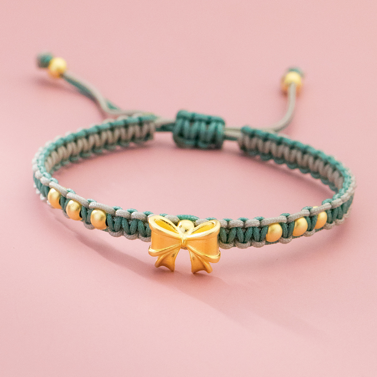 爱洛奇 s925纯银镀金色蝴蝶结编织红绳手链在逃公主手饰品s5789