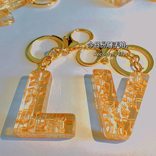 日本代购 lv 路易威登 24年夏季新款 牛皮 条纹logo 钥匙扣包挂饰