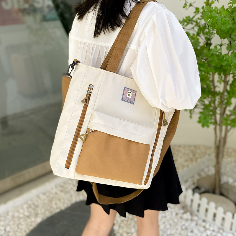 小学生手提书包女