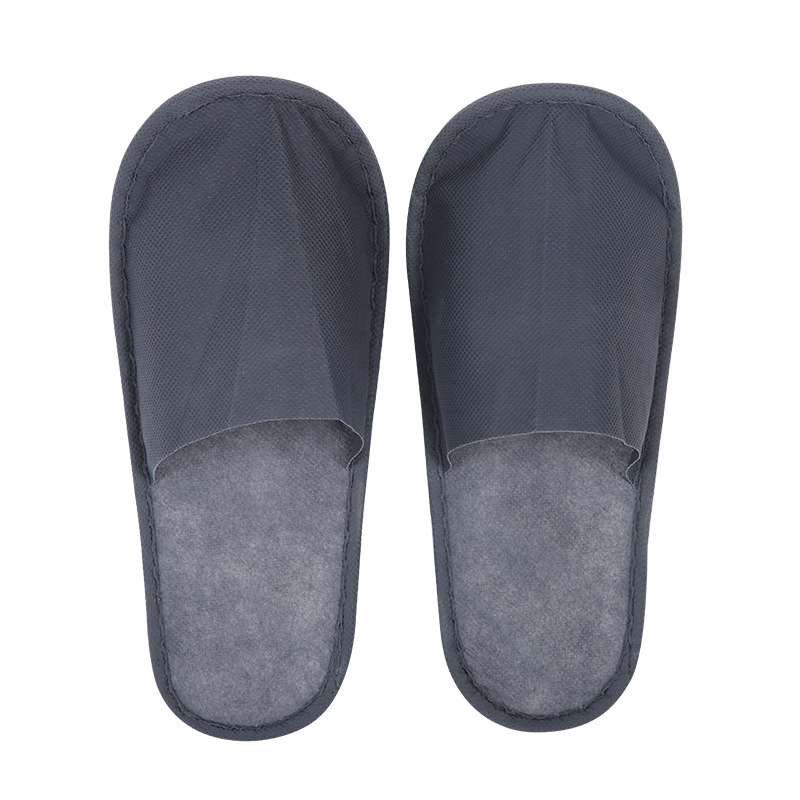 Wholesale Hotel Disposable Slippers Hanting Disposable Non-Woven Fabric Slippers Travel Portable B & B Slippers Manufacturer