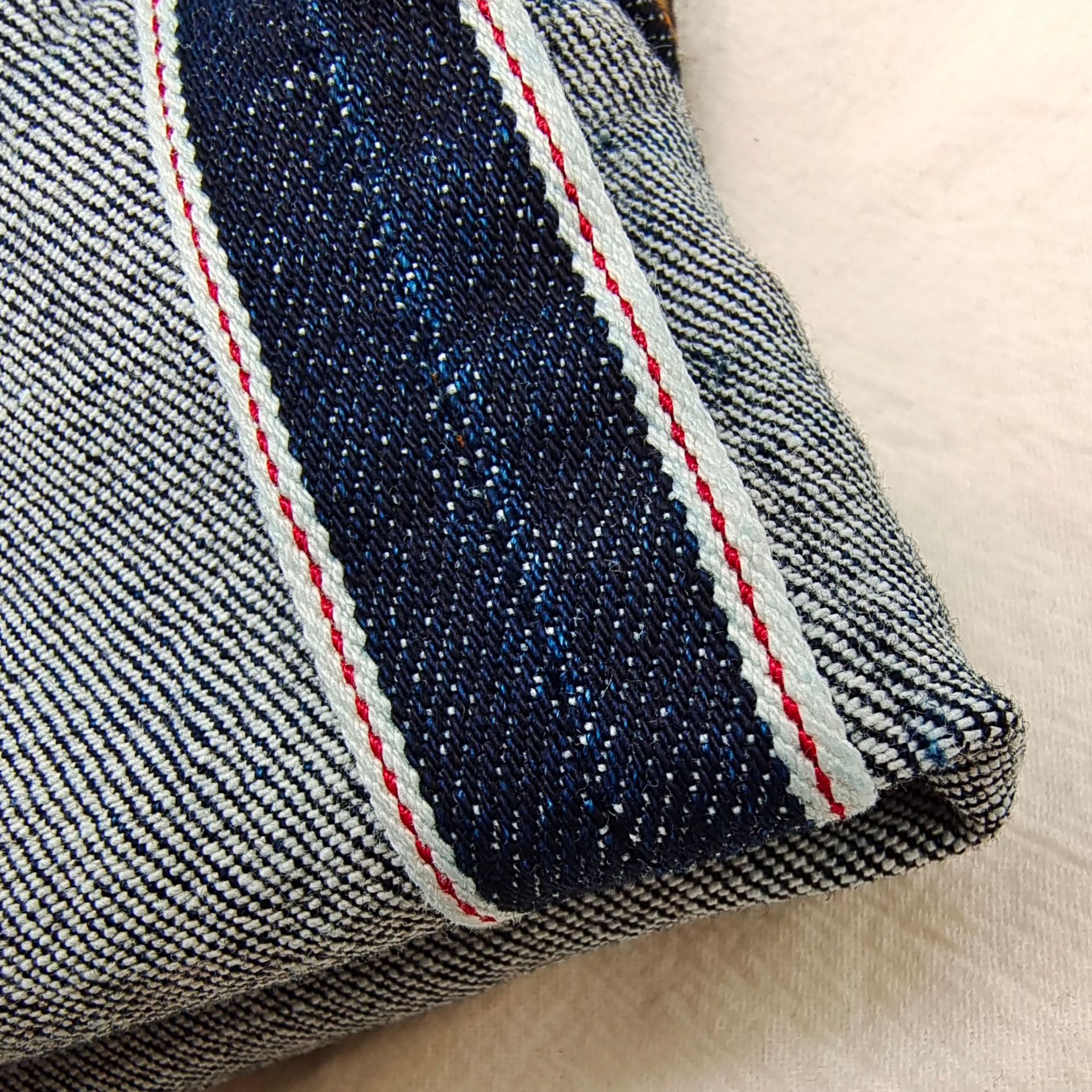 10支红边牛仔布12.5盎司赤耳丹宁牛仔布料窄幅时装牛仔面料