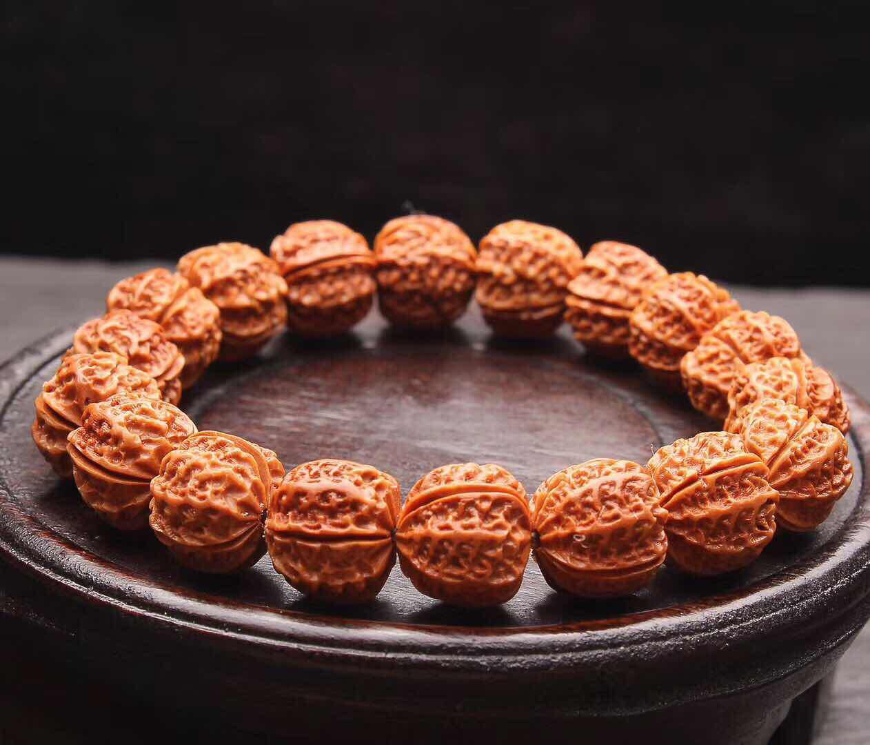 小核桃龙纹京八棱手串龙纹桃核雕刻手串正圆矮桩橘红皮文玩批发