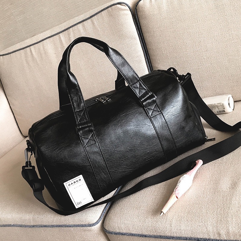 圆筒大容量运动飞机跨境旅行包健身新款手提包包男女pu防水行李袋