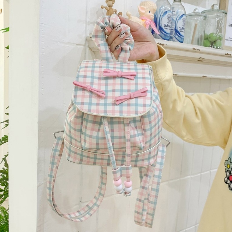 韩系小清新糖果色出街便携抽绳水桶包pu皮收纳女生粉色格子双肩包