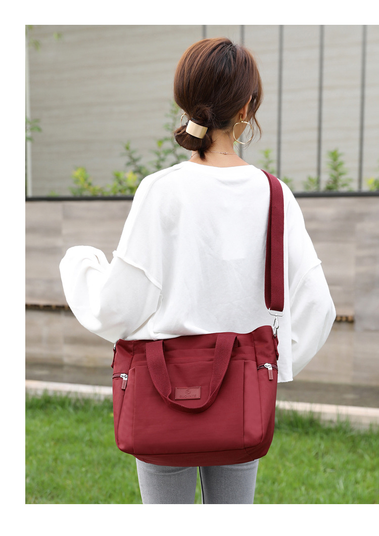 新款尼龙单肩包女包简约布包女士休闲旅游手提斜挎包时尚单肩包