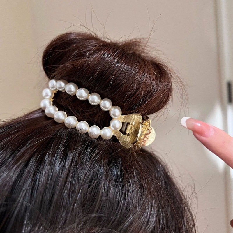 丸子头抓夹珍珠女网红2022年新款夹子头饰高马尾发夹盘发发饰批发