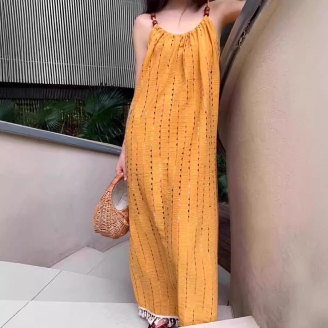 波西米亚黄色吊带连衣裙女夏大理云南旅游海边度假多巴胺沙滩长裙