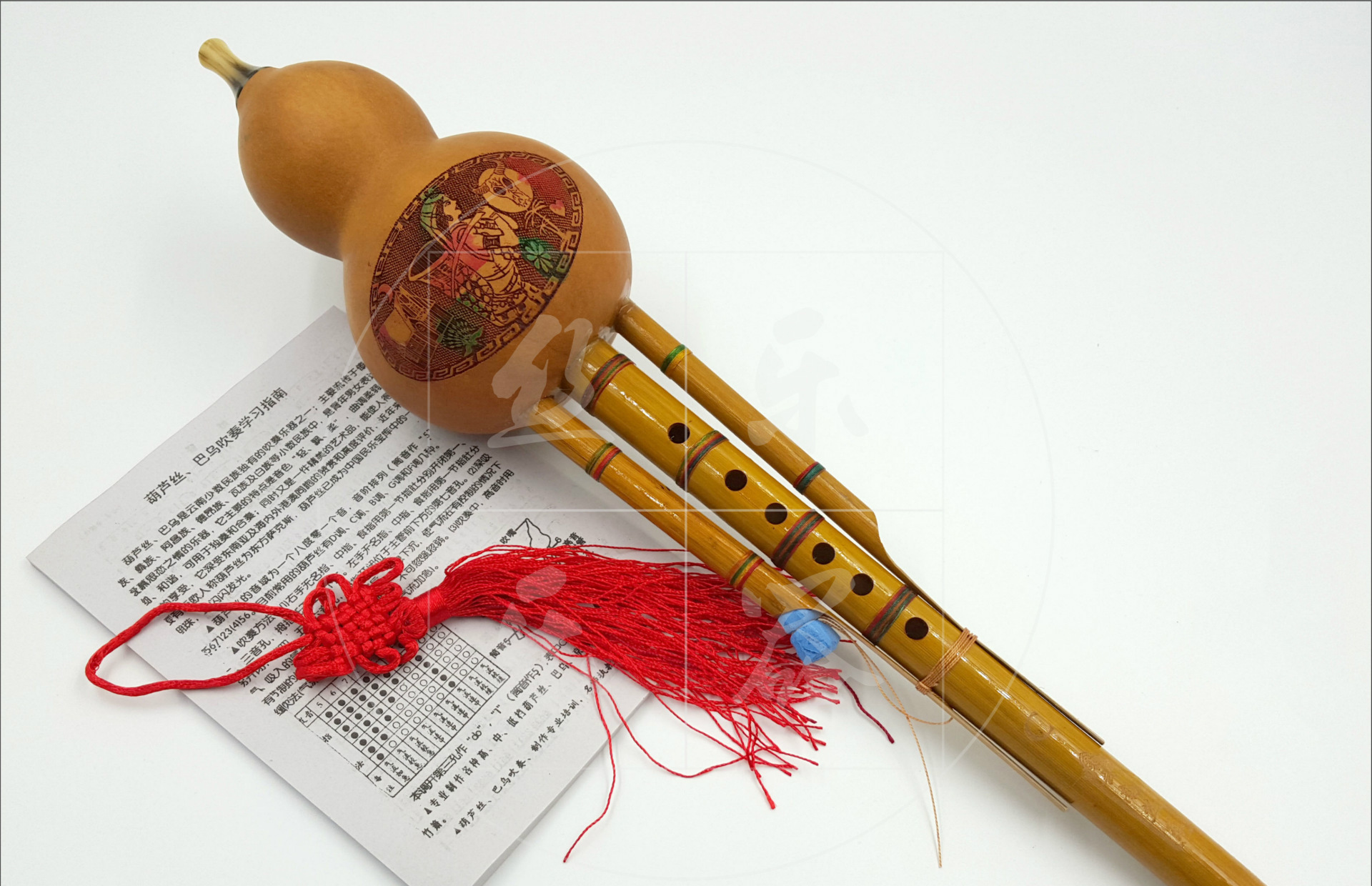 厂价直销:天然凤尾竹绑七彩线 初学双音葫芦丝降b调 c调乐器批发