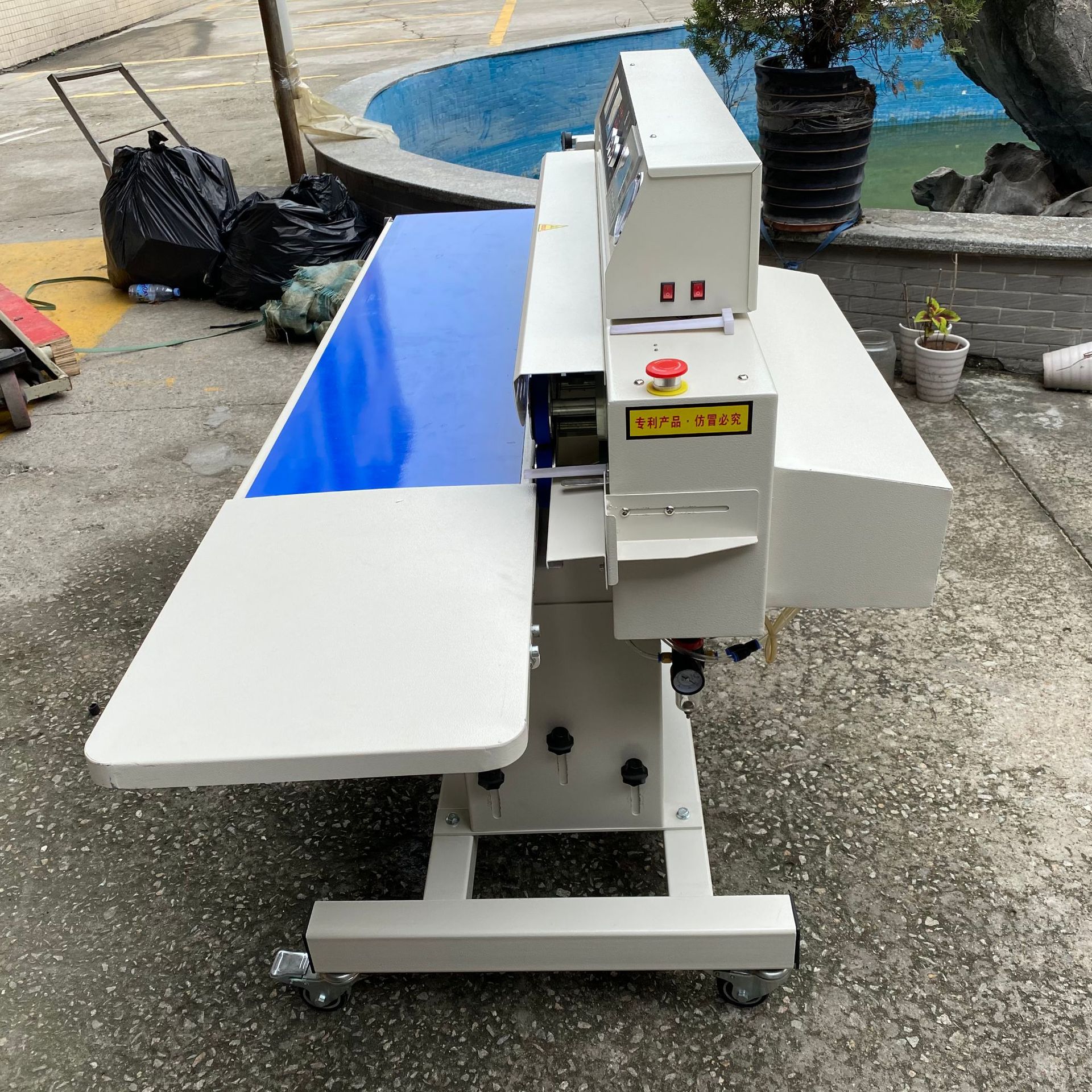 连续式真空抽气口罩封口机喷码印字计数真空封口机真空抽气封口机