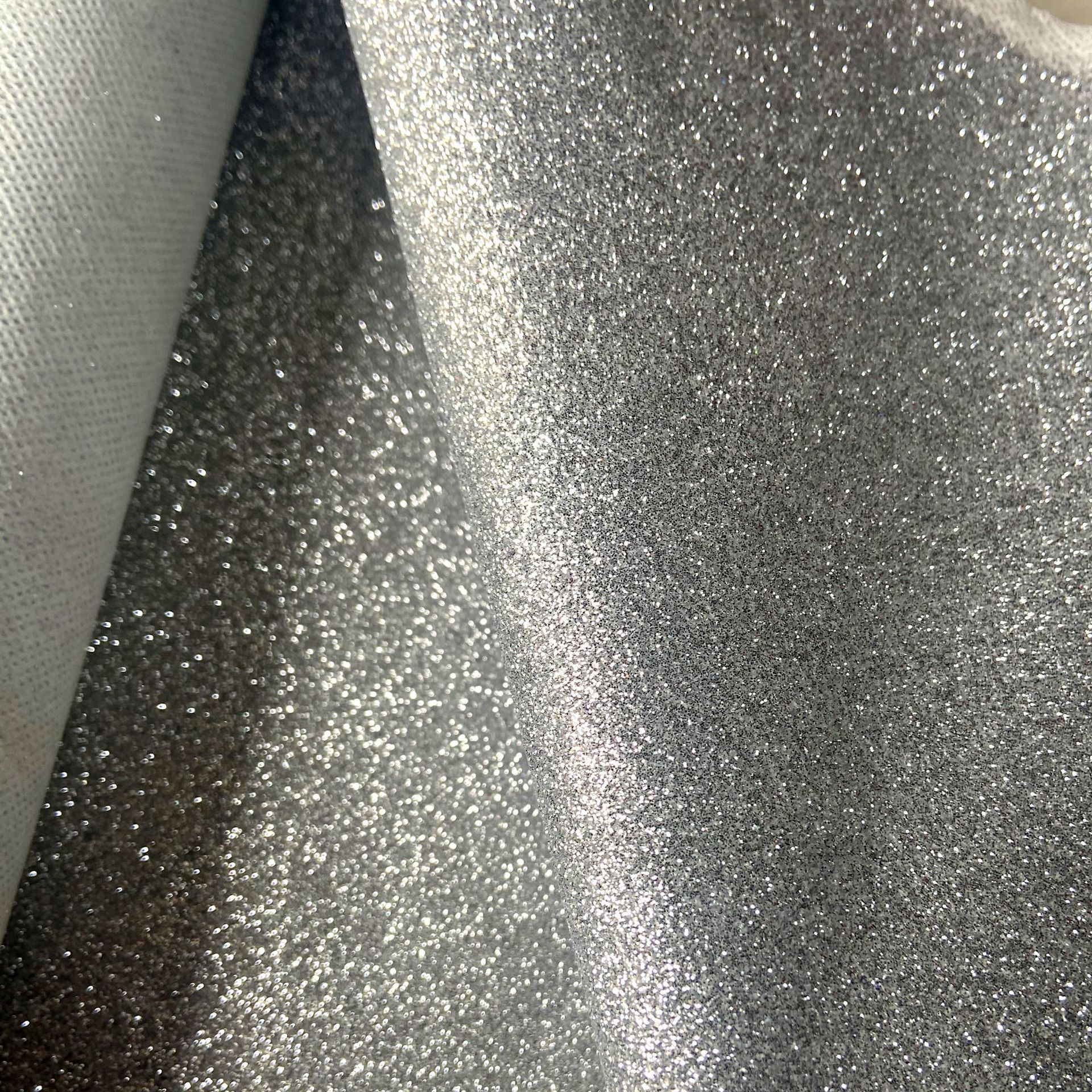 金葱粉无纺布闪光面料特pu皮革工艺品闪粉银粉布材料厂家直销
