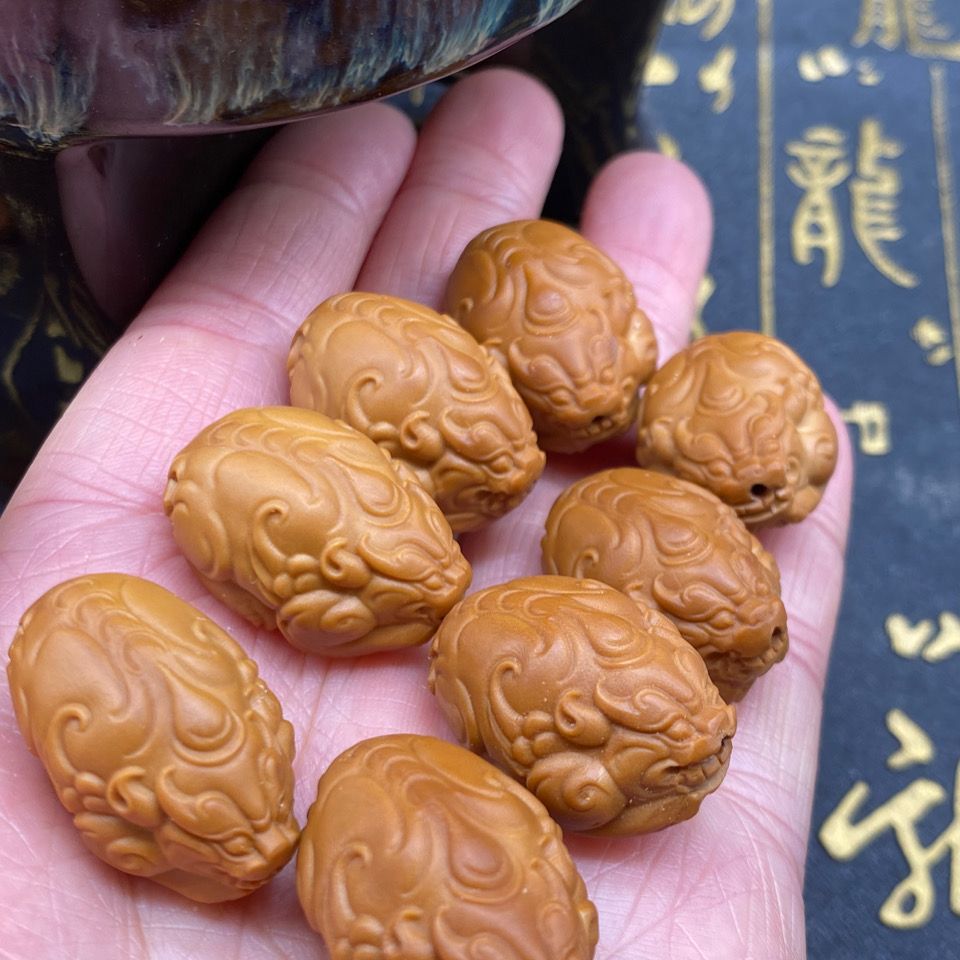 橄榄核貔貅挂坠橄榄核雕刻单籽貔貅文玩手把件橄榄核雕刻吊坠