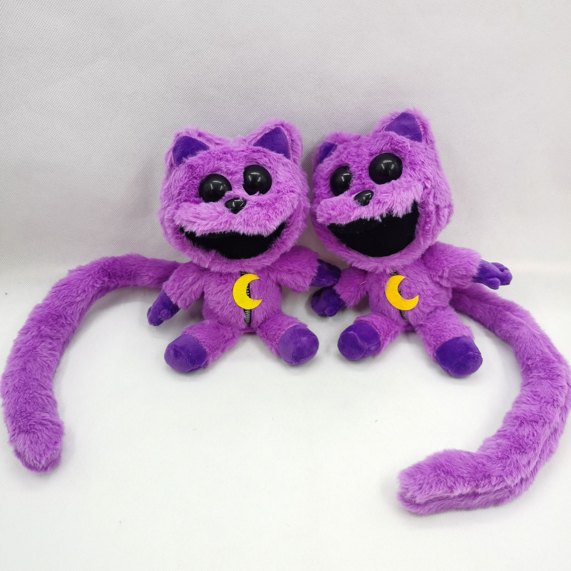 微笑动物恐怖紫色长尾猫毛绒公仔大嘴猫smiling critters布偶玩具
