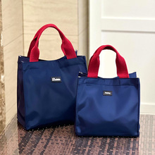 新款简约撞色小众小手提包小饭盒袋上班手拎零食袋妈咪包通勤小包