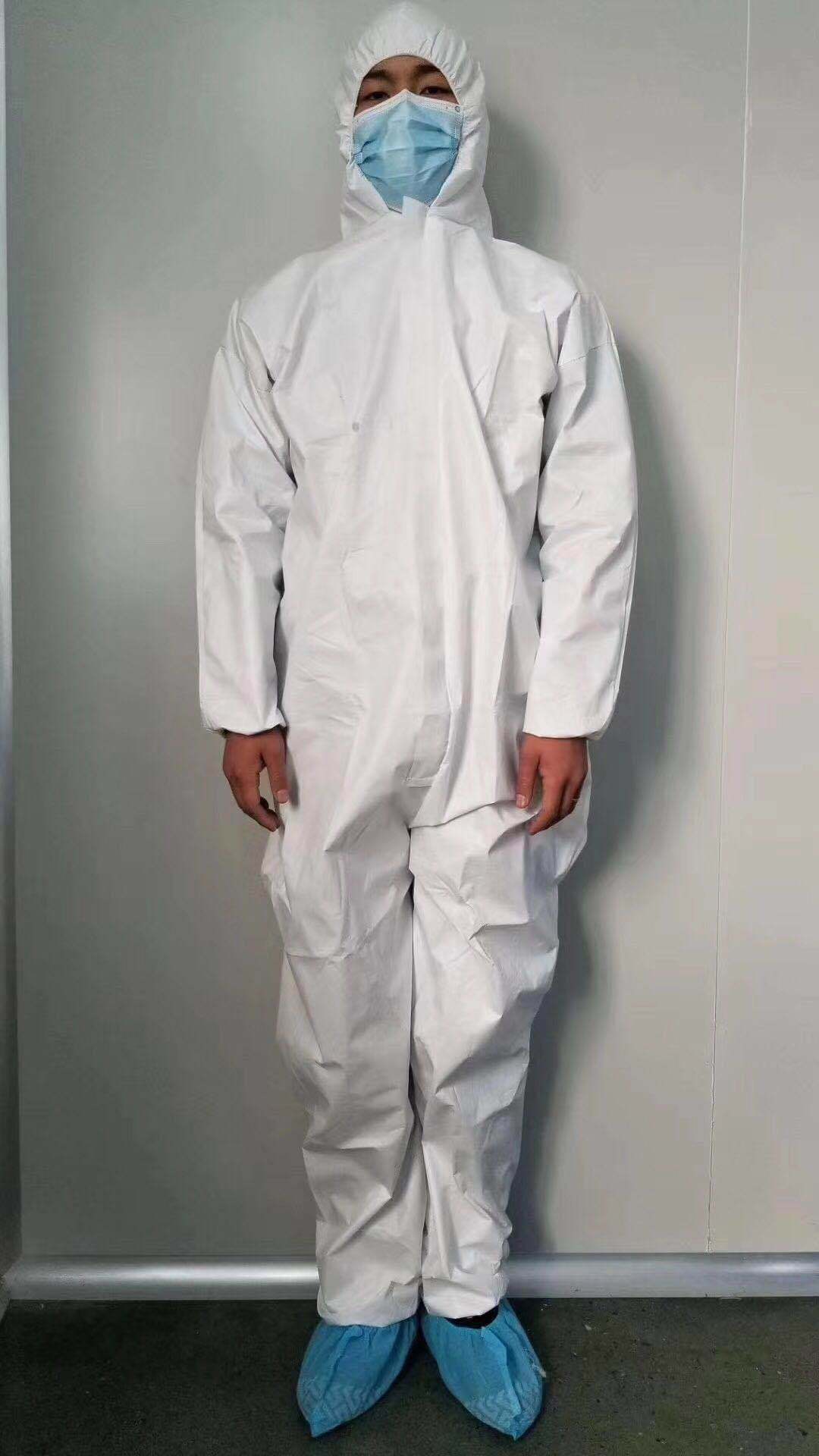 工厂直销现货一次性防护服连体带帽隔离服sms透气膜pp防尘防油