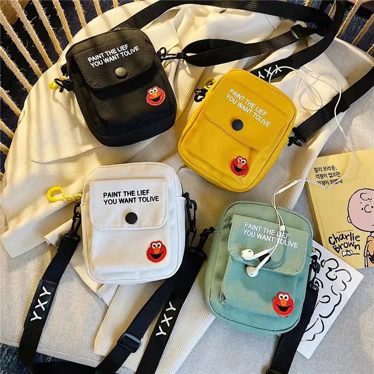 Versatile Backpack Shoulder Messenger Bag Canvas Mobile Coin Purse Sesame Street Frog Earphone Hole Ins Children's Bags