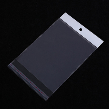 opp白色珠光膜卡头袋一次性不干胶塑料包装袋白色透明饰品挂孔袋