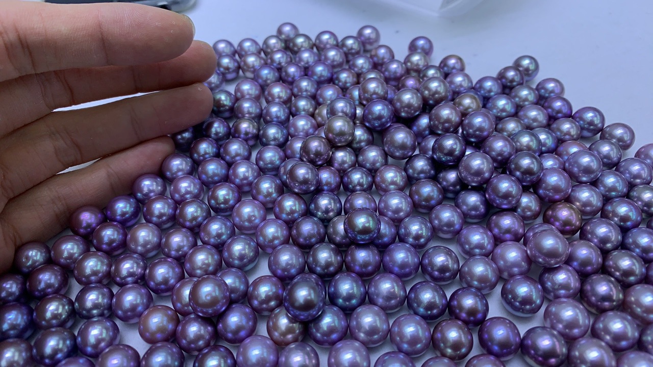天然紫色爱迪生珍珠正圆孔后微微瑕或微微生长纹11-12mm裸珠批发