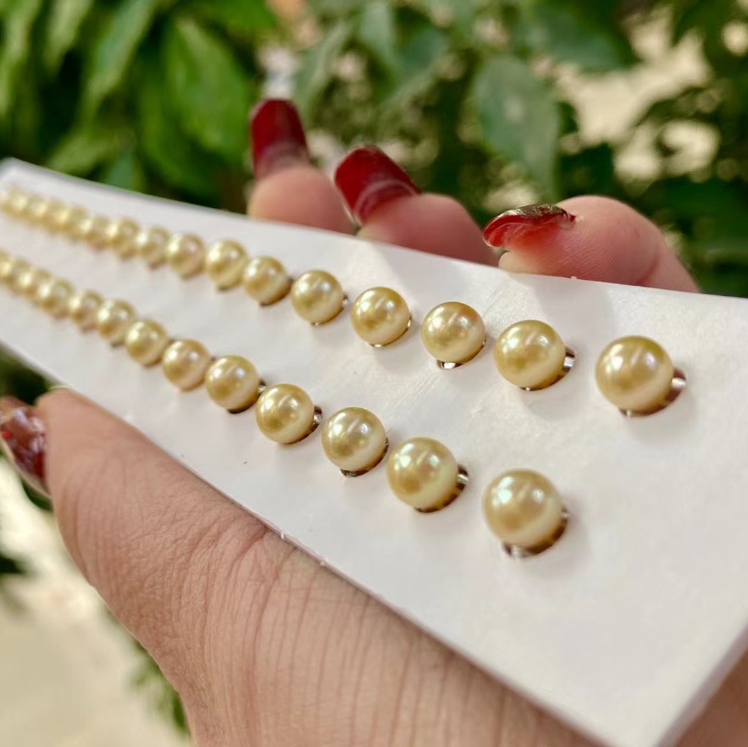 海水akoya羽皇金珍珠裸珠6mm正圆散珠几乎无瑕半孔耳饰-阿里巴巴