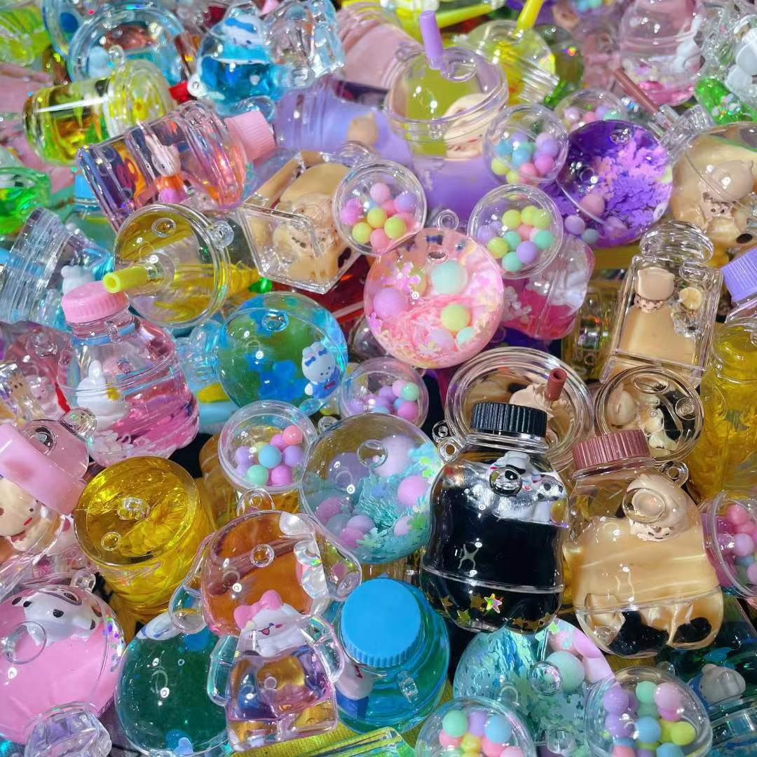 Popular Creative Cartoon Oil Quicksand Bottle Wholesale Drift Bottle Key Chain Accessories Handbag Pendant Small Ornaments