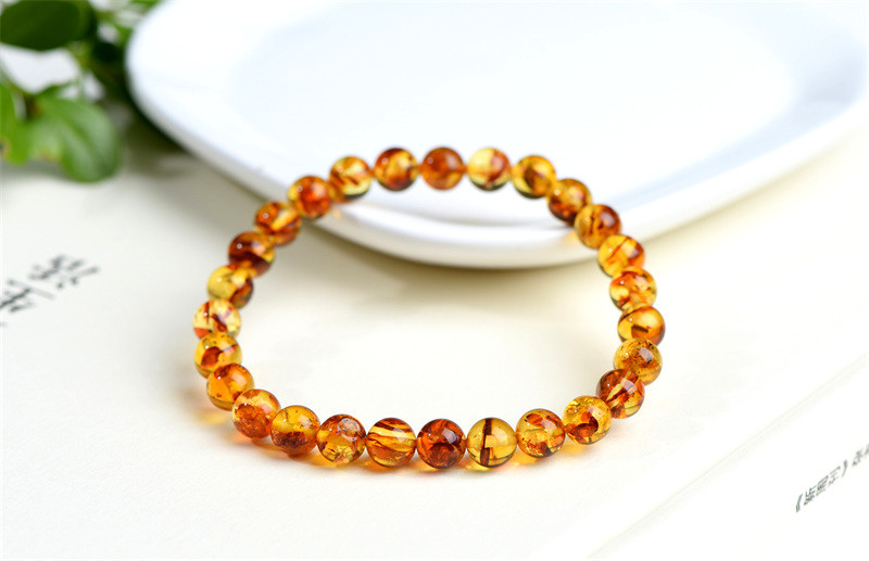 久雅水晶 天然黄色花珀手串 净水时尚花琥珀圆珠手链 厂家直销