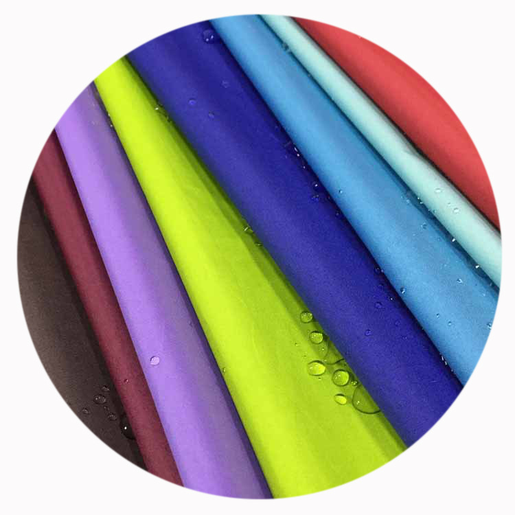 7米春亚纺黑胶布料黑色涂层雨伞布碰击布遮光布料