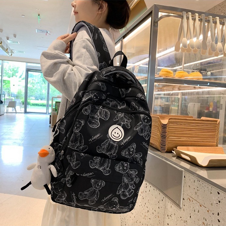 书包女初中生简约大学生双肩包2023新款大容量高中生小学生背包男